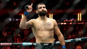 Benoît Saint Denis dans l'octogone après sa victoire contre Beneil Dariush à l'UFC 322, novembre 2025