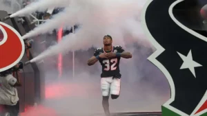 David Montgomery entre sur le terrain sous le maillot des Houston Texans, saison 2026 de NFL