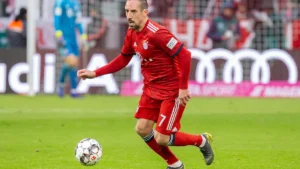 Franck Ribéry balle au pied sous le maillot du Bayern Munich face à Wolfsburg, mars 2019