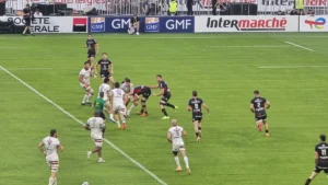 Les joueurs du Stade Toulousain en maillot noir face à Bordeaux-Bègles en Top 14, juin 2025
