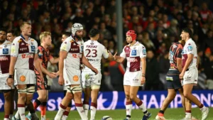 Les joueurs de l'Union Bordeaux-Bègles en maillot blanc lors d'un match de Champions Cup, octobre 2026